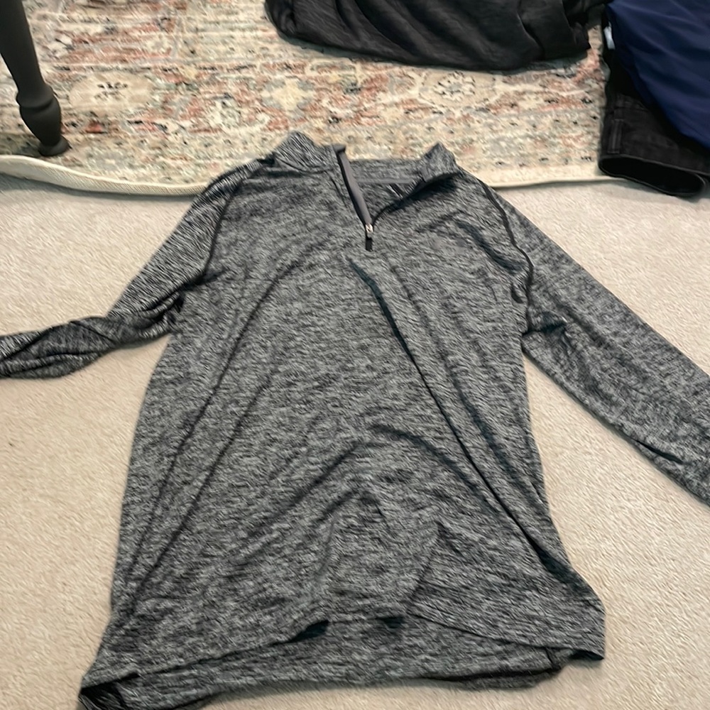 Under armor quarter zip, light material, loose fit
